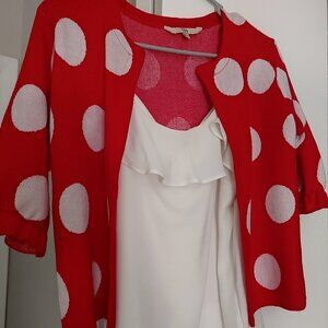 White top with polka dot sweater